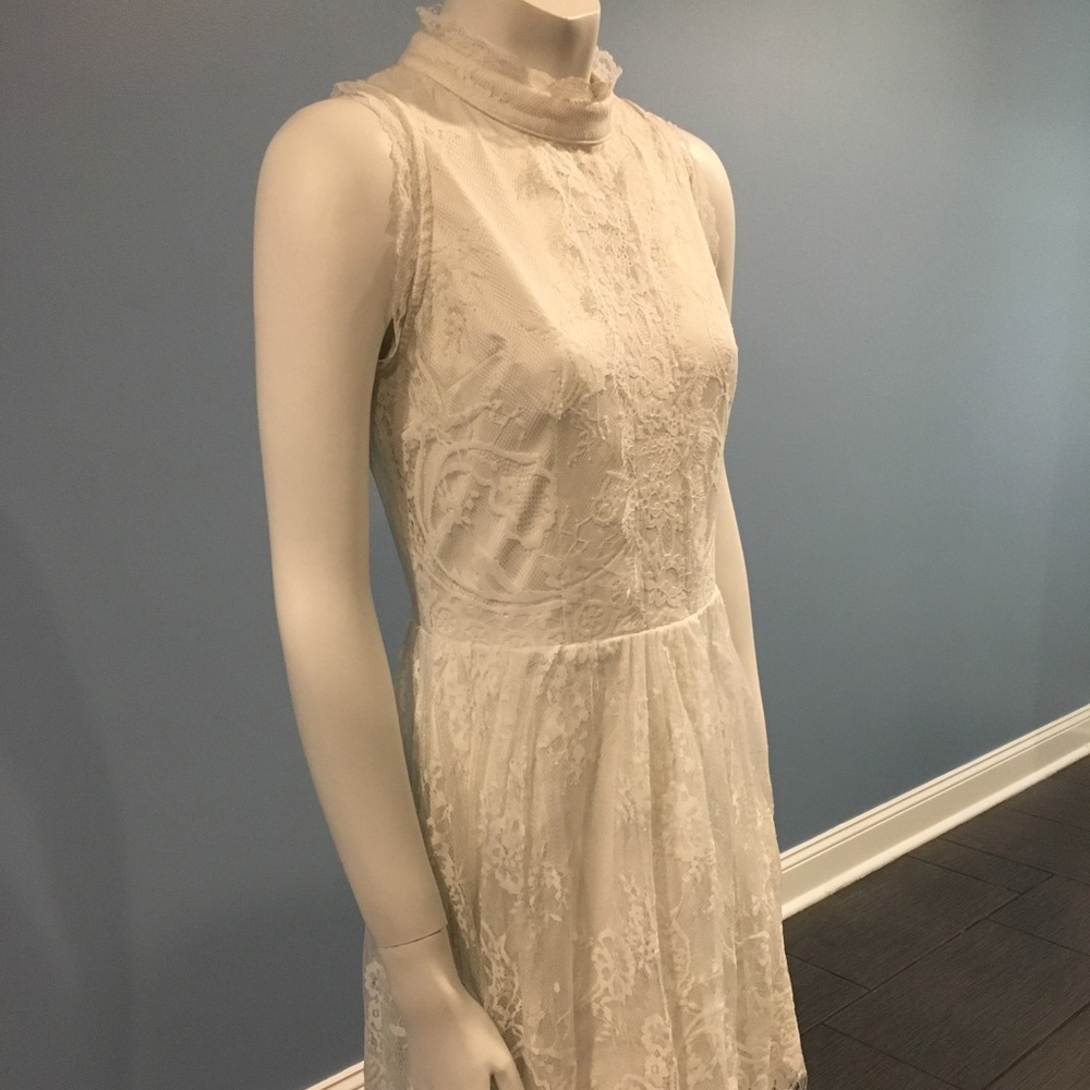 White Lace Haltered Style Dress with Peekaboo Back